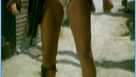 Pic: Kathleen Kinmont in She-Wolves of the Wasteland