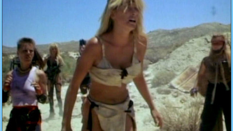 Pic: Kathleen Kinmont in She-Wolves of the Wasteland (1987)