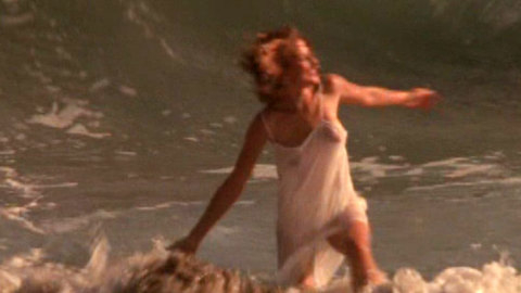 Pic: Kari Wuhrer in Sand