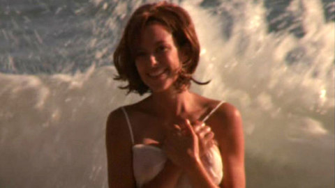 Pic: Kari Wuhrer in Sand