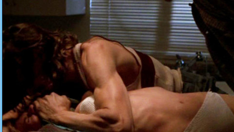 Pic: Kari Wuhrer in Sand