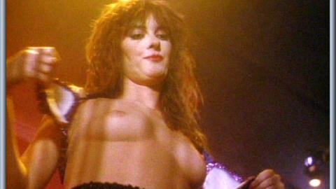 Pic: Karen Mayo-Chandler in Stripped to Kill Il