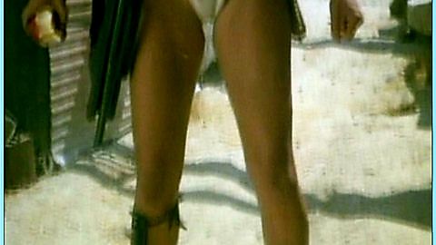 Pic: Kathleen Kinmont in She-Wolves of the Wasteland (1987)