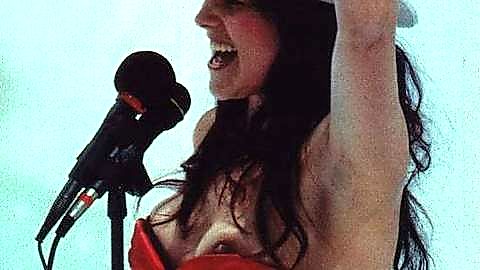 Pic: Lucy Lawless in Detroit Red Wings Game: National Anthem (1997)