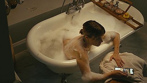 Pic: Kristen Bell in The Woman in the House Across the Street from the Girl in the Window (2022)